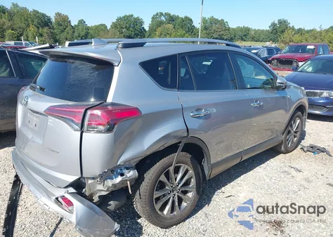 2018 Toyota Rav4 Limited z USA, uszkodzony, nr VIN JTMYFREVXJD112924